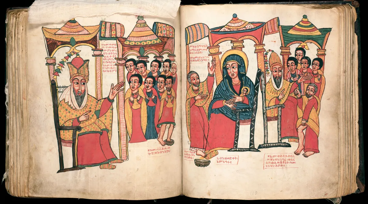 An open manuscript: on each page a crowned figure sits under painted arches, with rows of faces and lines of Ge'ez script.