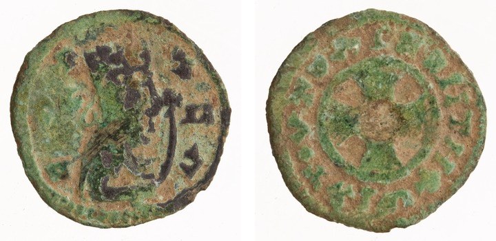 Both sides of a small green-corroded copper coin: a royal bust on one side and a cross in a circle on the other.