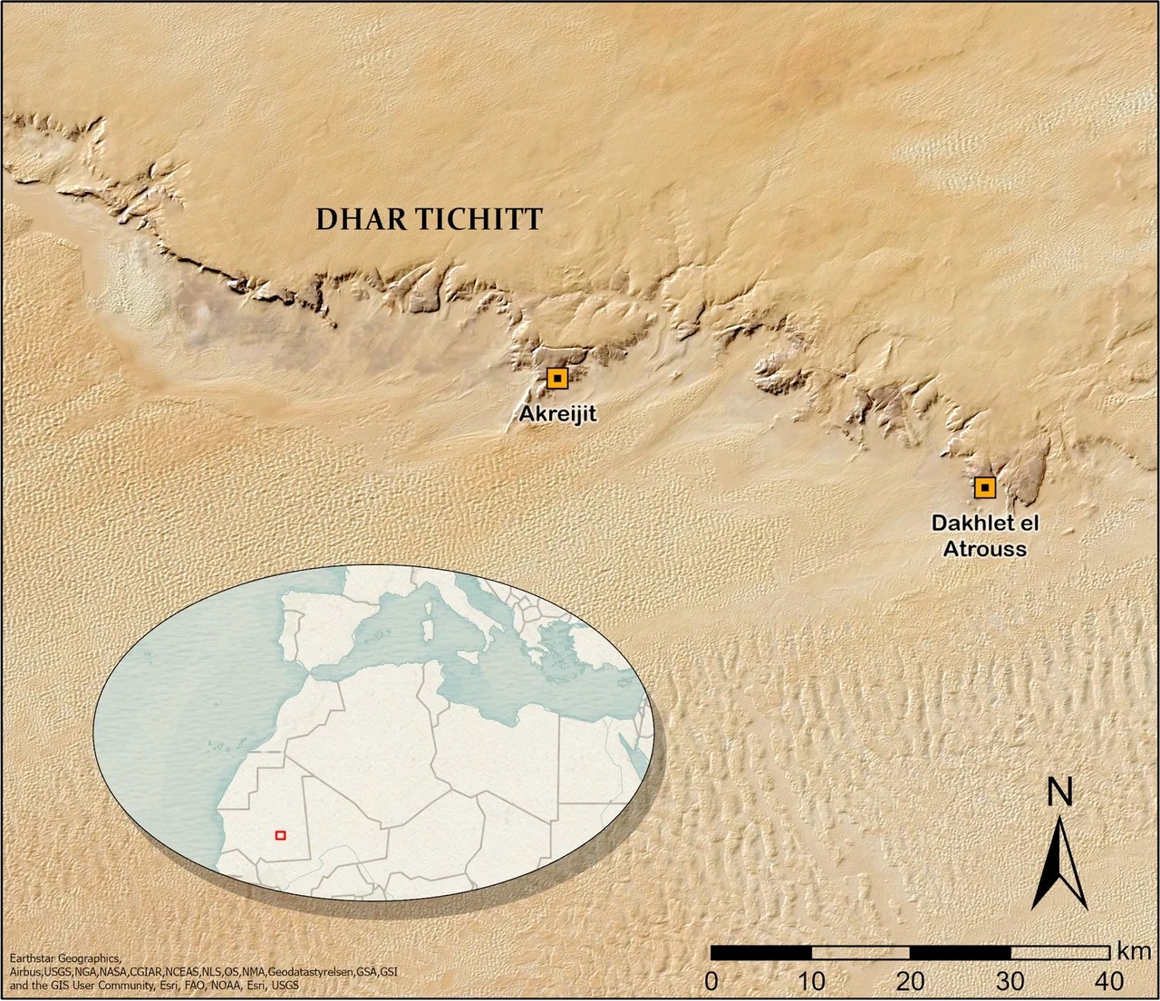 A satellite-relief map of an escarpment crossing a sand sea, with two sites marked and labeled, an inset map of northwest Africa, a north arrow and a scale bar.