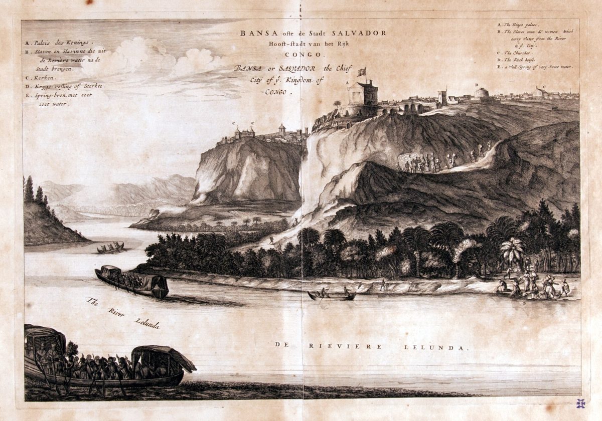 An engraved bird's-eye view of a walled hilltop city with churches, houses and a palace.