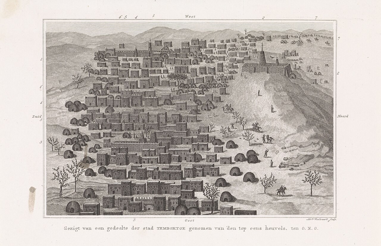 An engraved view across a crowded town of flat-roofed houses and scattered round huts, with a tower rising at the center.